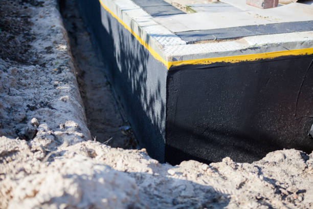 Professional Emergency Waterproofing technician working in East Norwich, NY